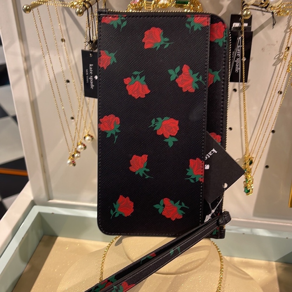 Kate Spade Lucy Medium L-Zip Wristlet
COLOR:
Black Multi
NWT - Picture 13 of 16